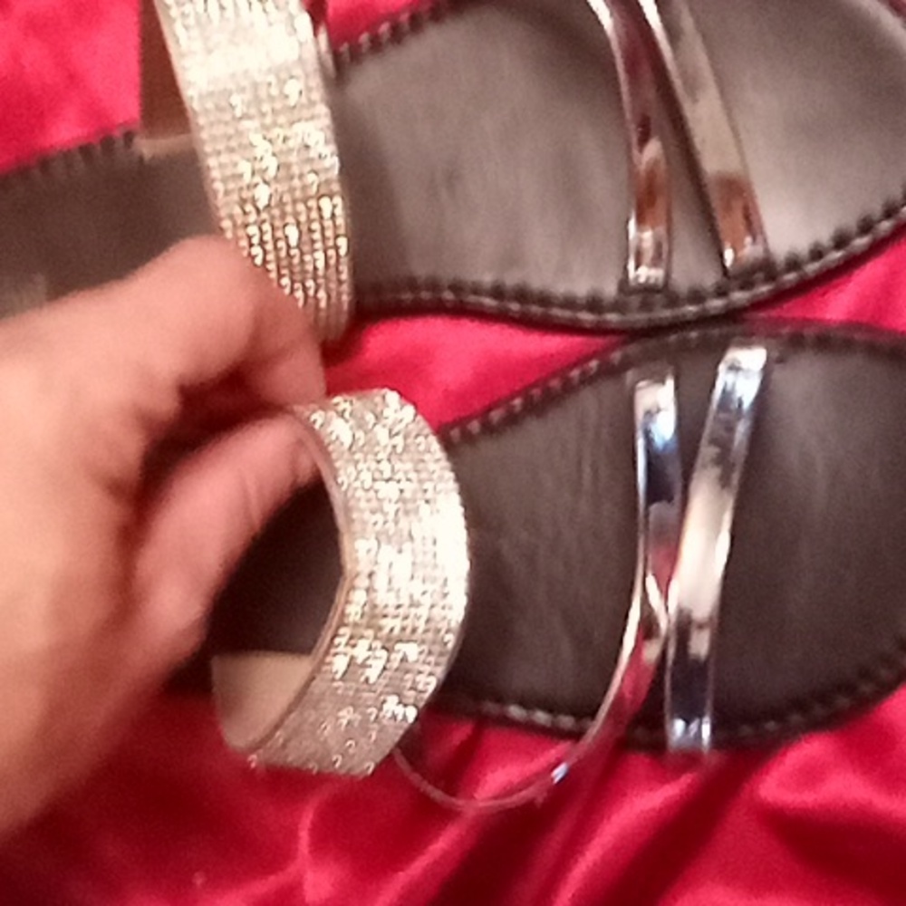 Brand new black and diamond accent sandals.